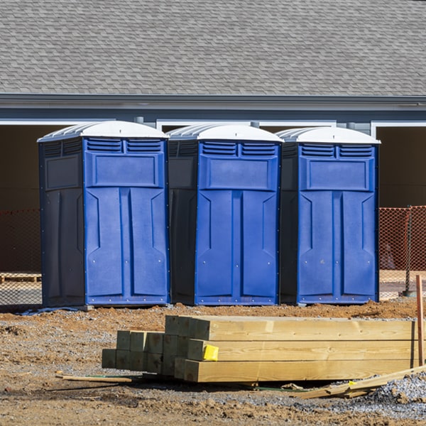 what is the cost difference between standard and deluxe porta potty rentals in Buckner Illinois